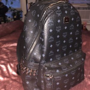 ❗️Rare Find❗️MCM Stark side stud backpack LEATHER